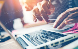 Typing on laptop close-up. Man working on computer
