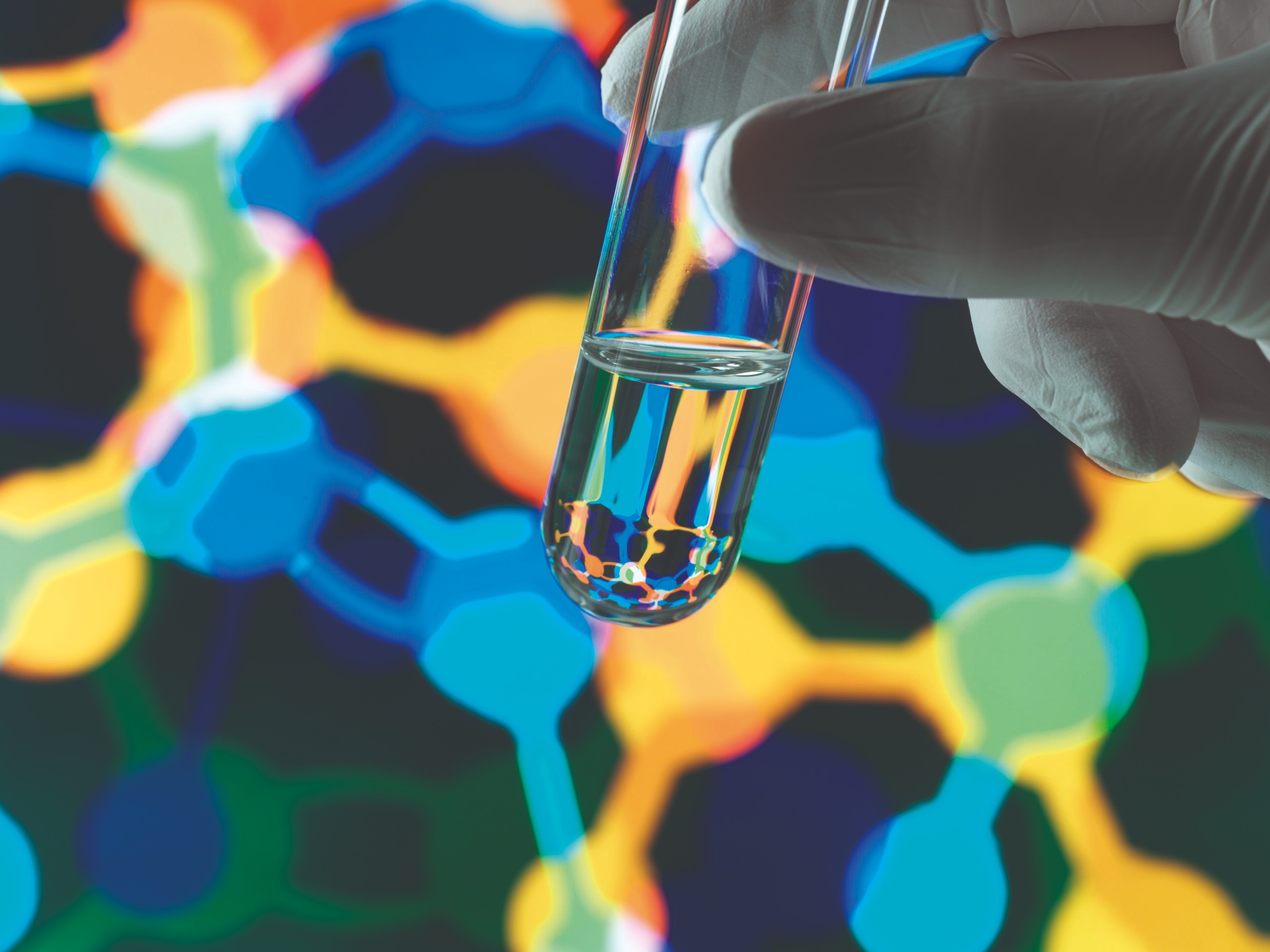 Biotechnology research Test tube containing a chemical formula with a illustration of structure on the screen in the laboratory