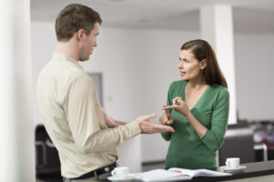 Woman and man having a dispute in an office