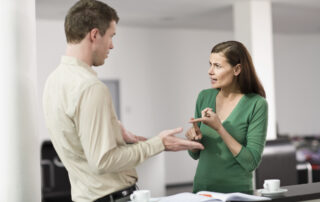 Woman and man having a dispute in an office