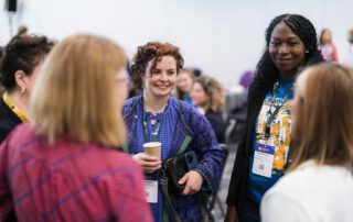 International Forum delegates having coffee