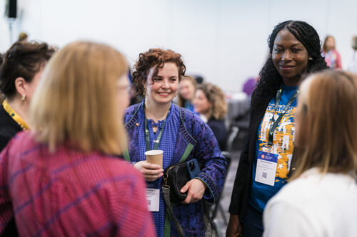 International Forum delegates having coffee
