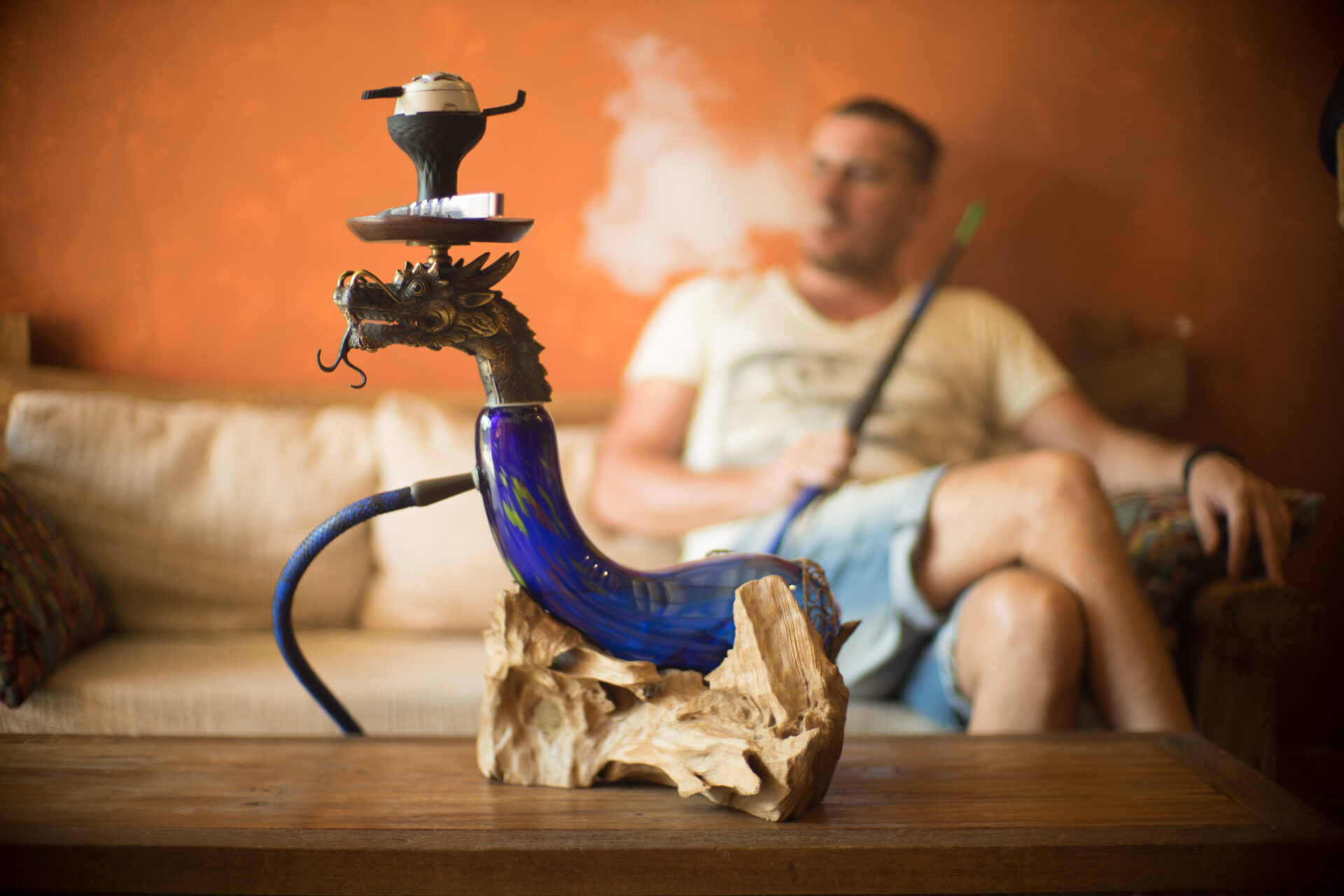 man smoking shisha