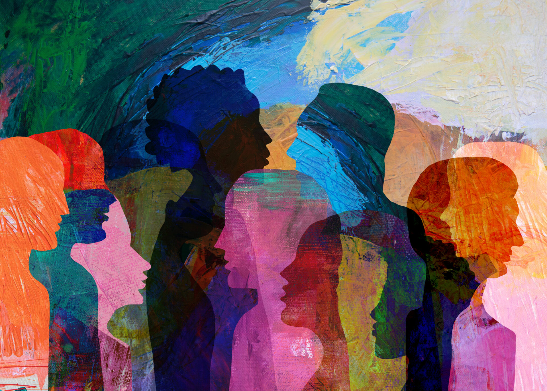 Overlapping, multicolored human silhouettes facing different directions in an abstract art composition, symbolizing community diversity.